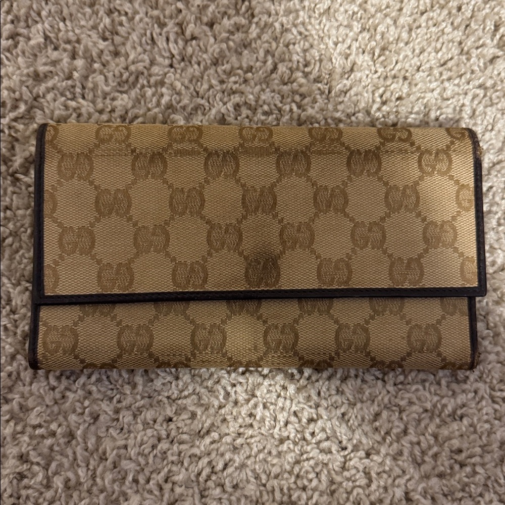 Authentic Gucci Tan and Brown Monogram Clutch